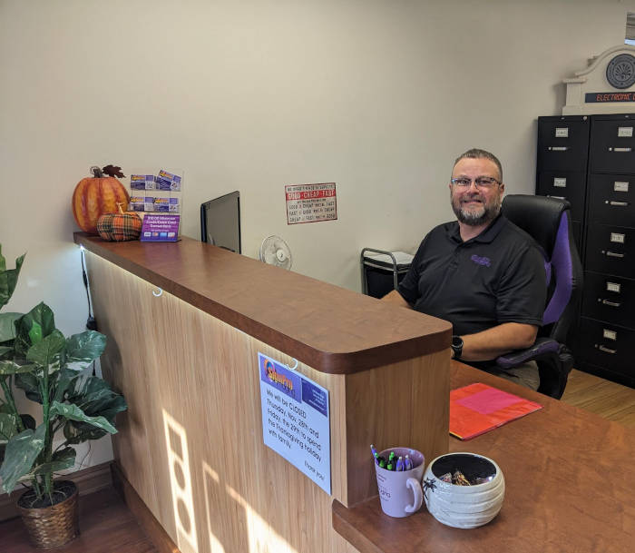 About us - Man at desk